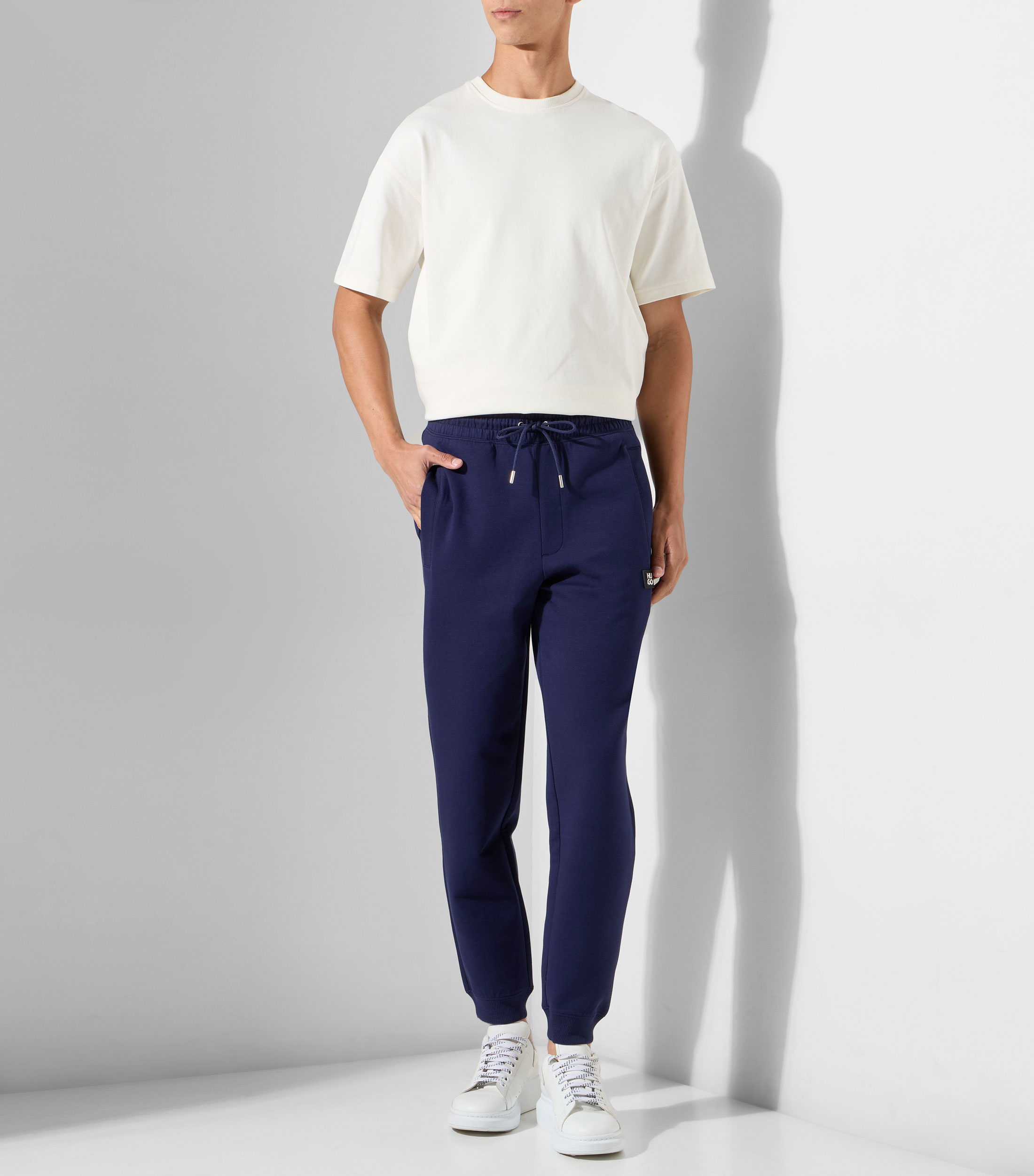 Pants de algodón con logo apilado Hombre
